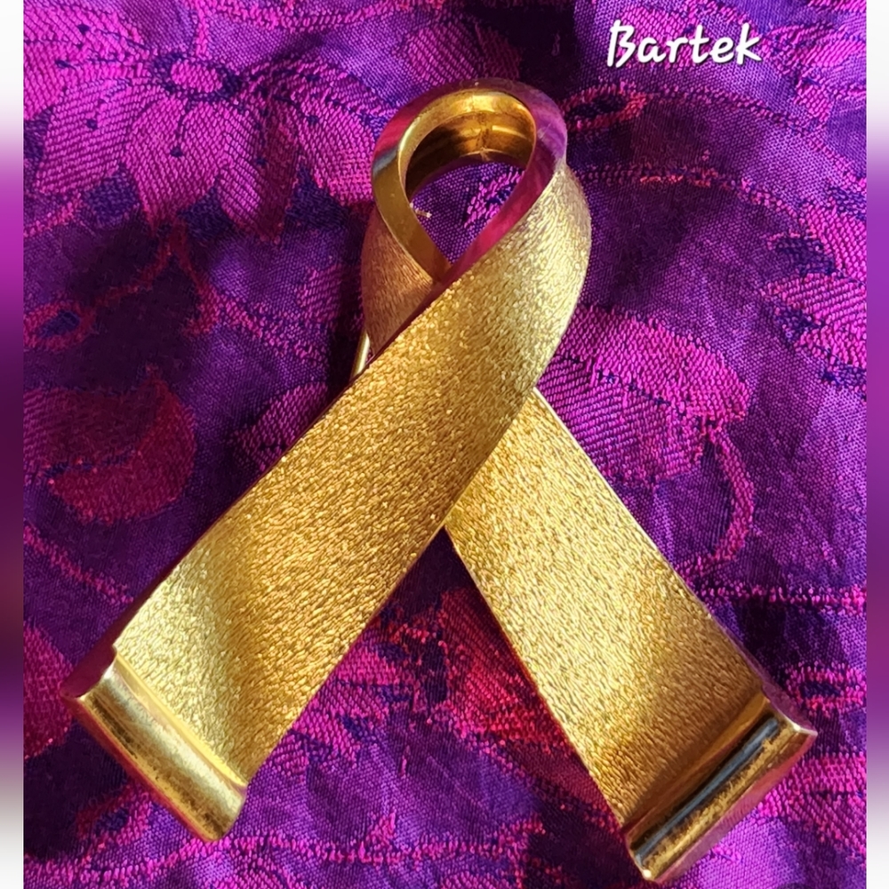 Vintage Bartek goldtone ribbon.  Excellent cond.
